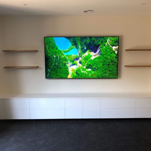 custom wall unit with floating shelves (1)