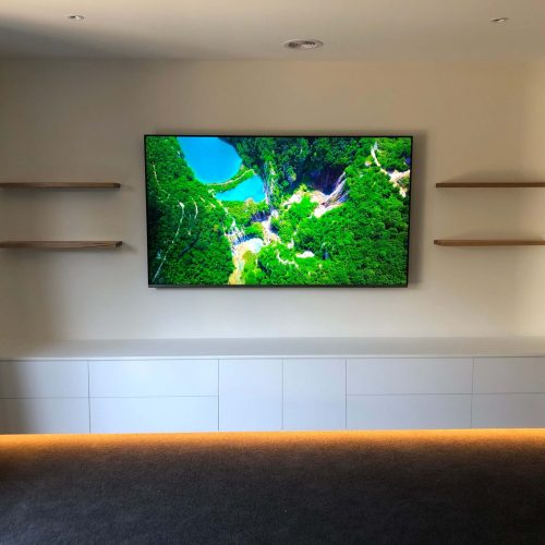 custom wall unit with floating shelves